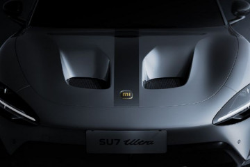 Наконец-то функционально: Xiaomi предлагает бесплатное аэродинамическое обновление для владельцев SU7 Ultra с вентилируемым капотом  Xiaomi SU7 Ultra